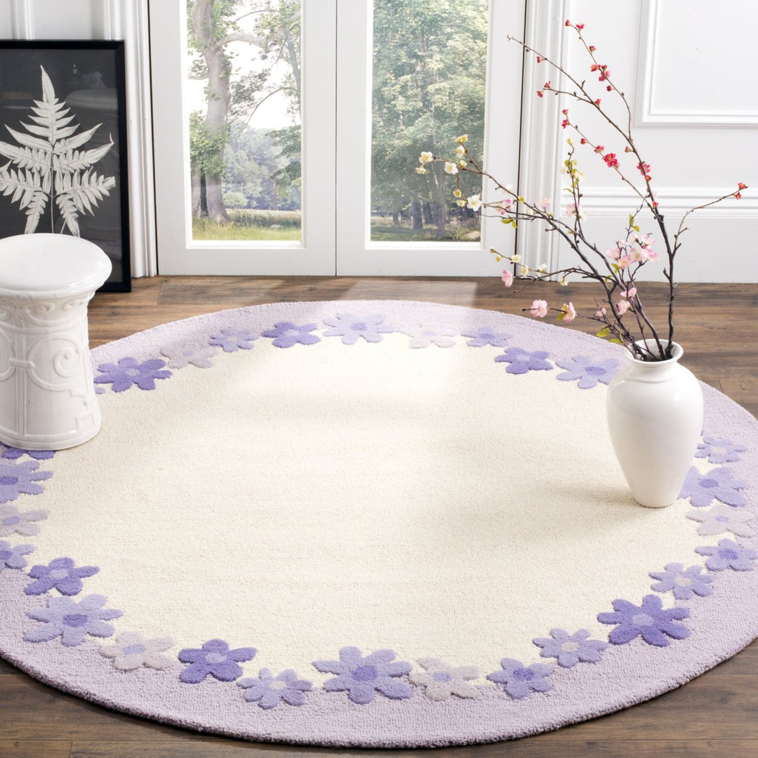 SAFAVIEH Kids SFK357A Handmade Ivory / Lavender Rug Image 2