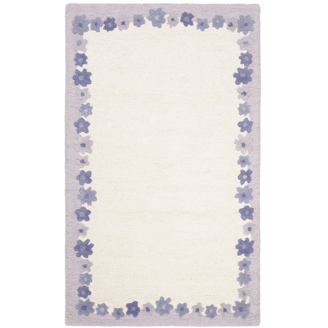 SAFAVIEH Kids SFK357A Handmade Ivory / Lavender Rug Image 1