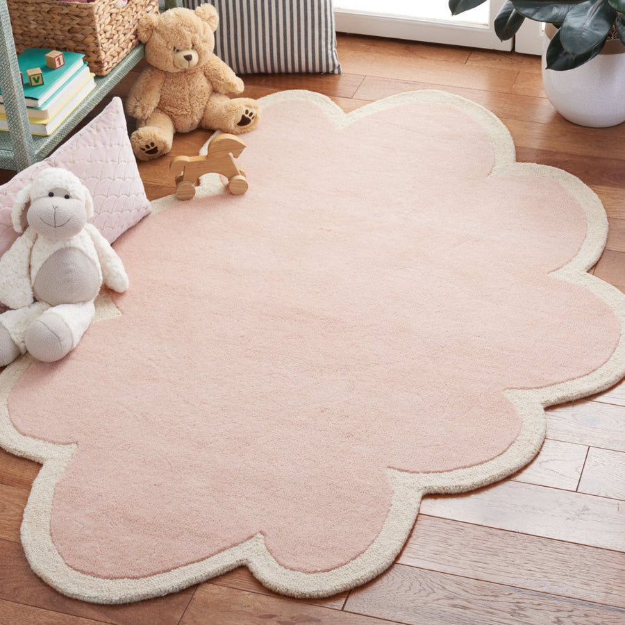 SAFAVIEH Kids Collection SFK913P Handmade Pink/Ivory Rug Image 1