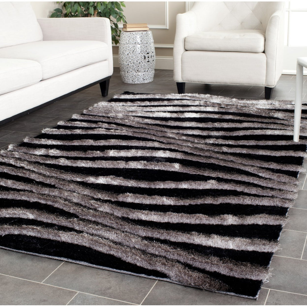 SAFAVIEH 3D Shag SG551E Handmade Black / Grey Rug Image 1