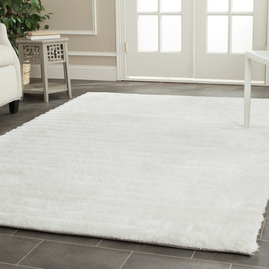 SAFAVIEH 3D Shag Collection SG554A Handmade Pearl Rug Image 1