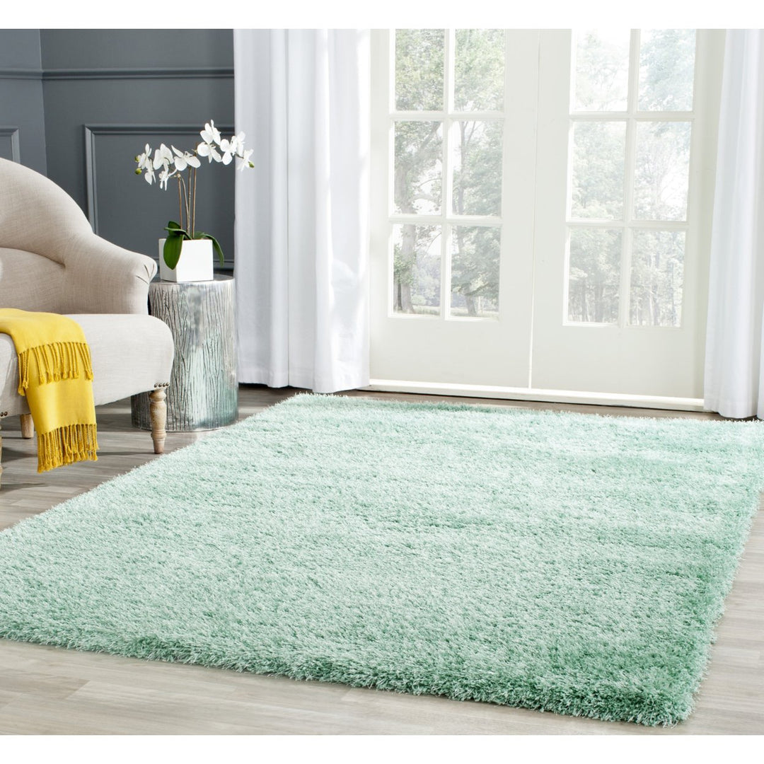 SAFAVIEH Charlotte Shag Collection SGC720T Teal Rug Image 1