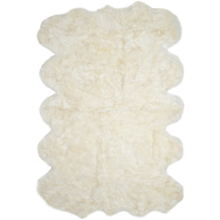 SAFAVIEH Sheep Skin SHS211A Handwoven Natural / White Rug Image 1