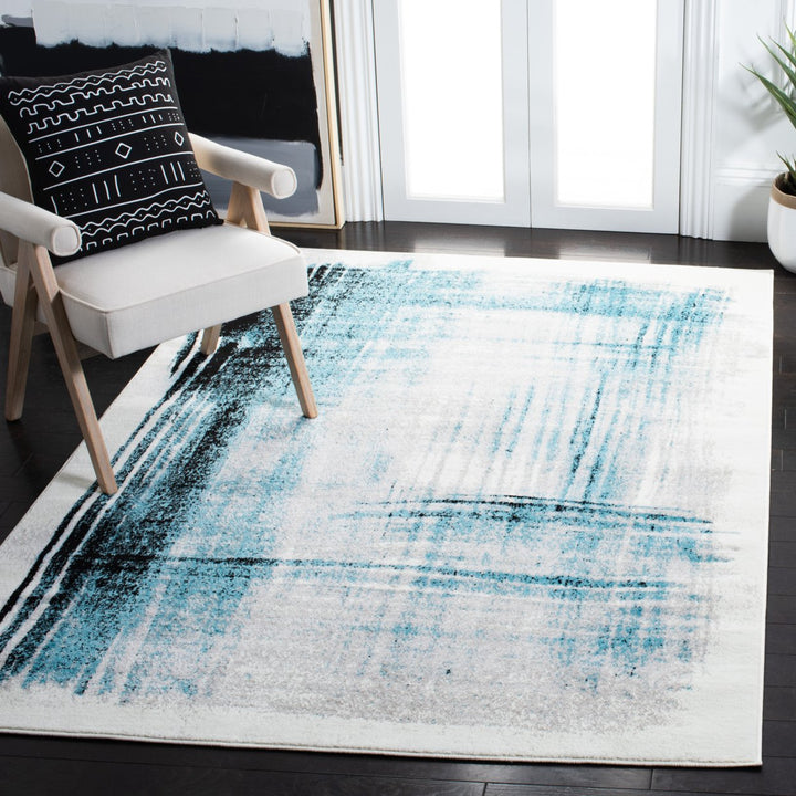 SAFAVIEH Skyler Collection SKY152K Ivory / Teal Rug Image 1