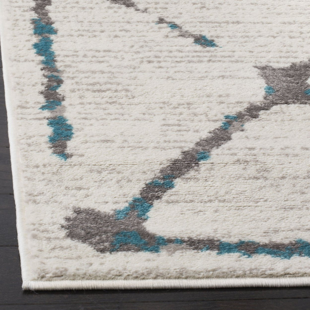 SAFAVIEH Skyler Collection SKY197D Ivory / Blue Rug Image 7