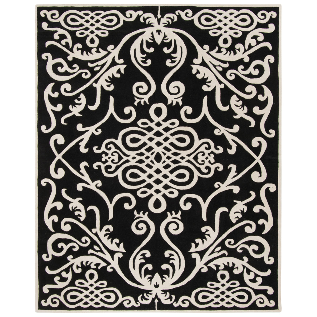 SAFAVIEH Soho SOH120A Handmade Black / Ivory Rug Image 1