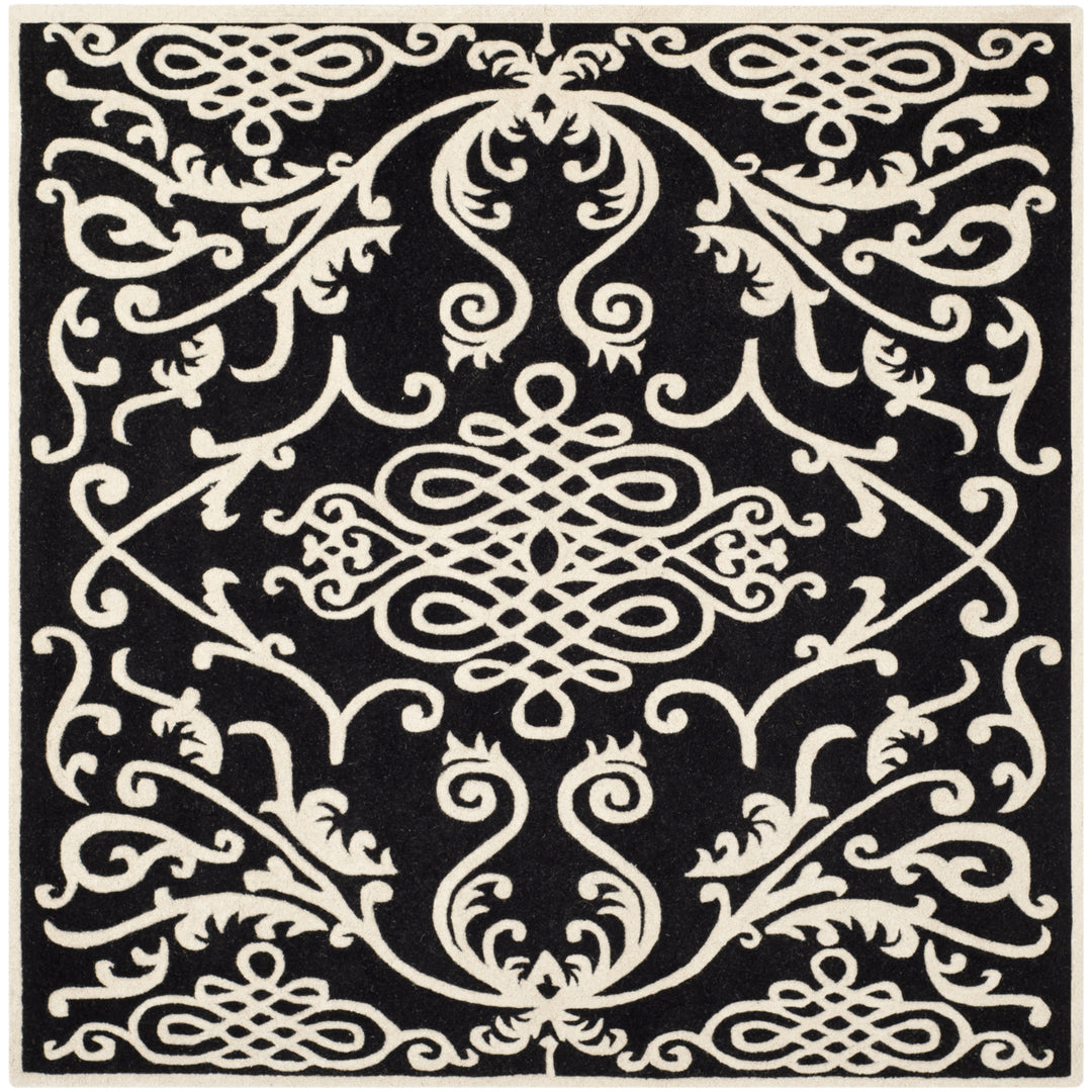 SAFAVIEH Soho SOH120A Handmade Black / Ivory Rug Image 5