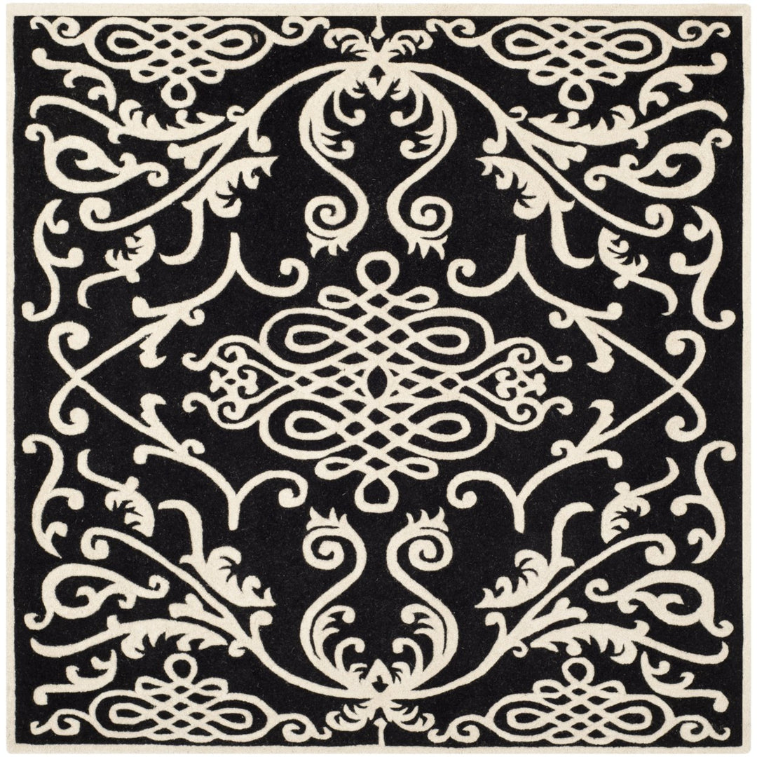 SAFAVIEH Soho SOH120A Handmade Black / Ivory Rug Image 1