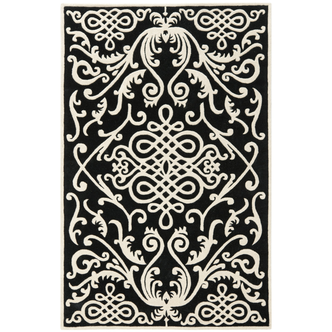 SAFAVIEH Soho SOH120A Handmade Black / Ivory Rug Image 11