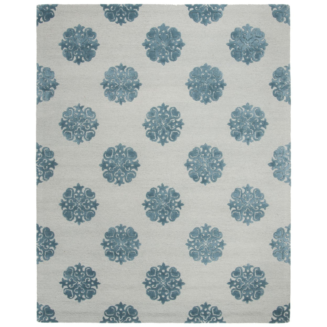 SAFAVIEH Soho SOH213A Handmade Ivory / Light Blue Rug Image 1