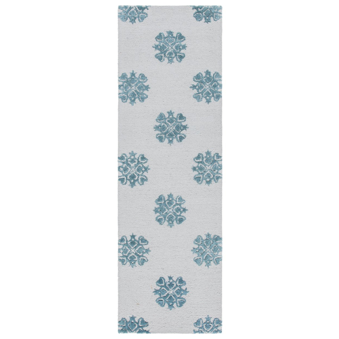 SAFAVIEH Soho SOH213A Handmade Ivory / Light Blue Rug Image 5