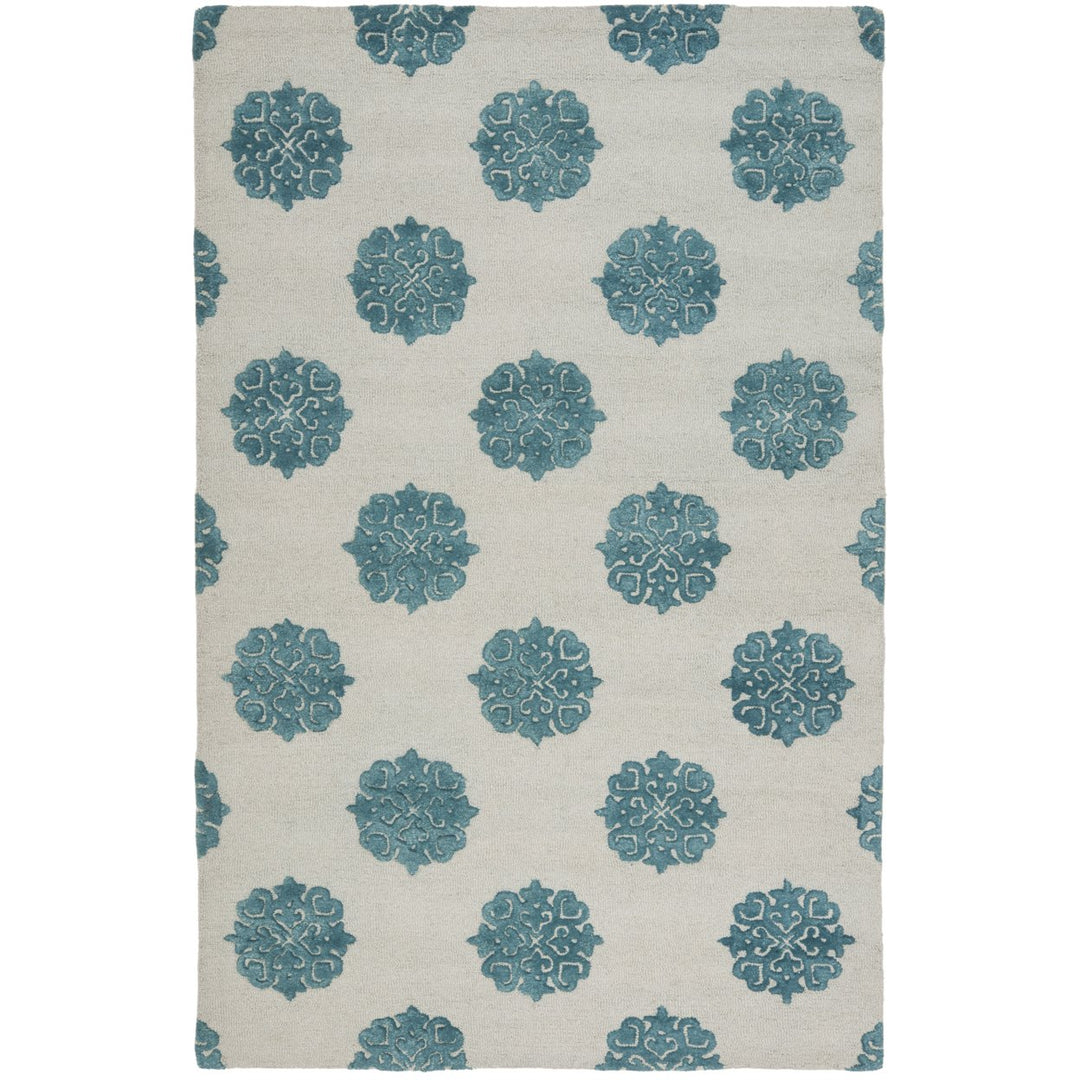 SAFAVIEH Soho SOH213A Handmade Ivory / Light Blue Rug Image 1