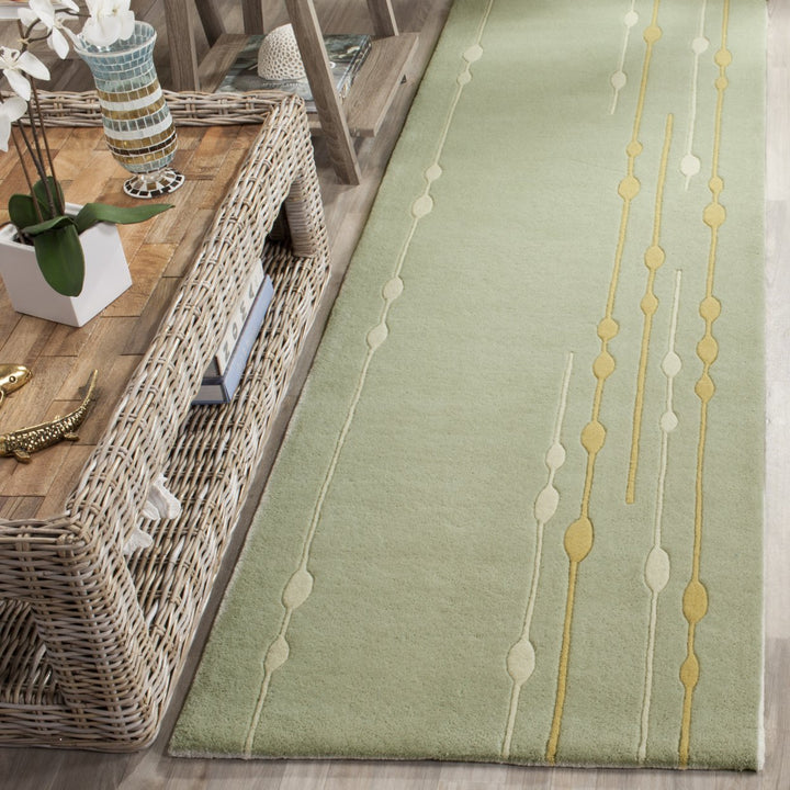 SAFAVIEH Soho Collection SOH303A Handmade Light Green Rug Image 3