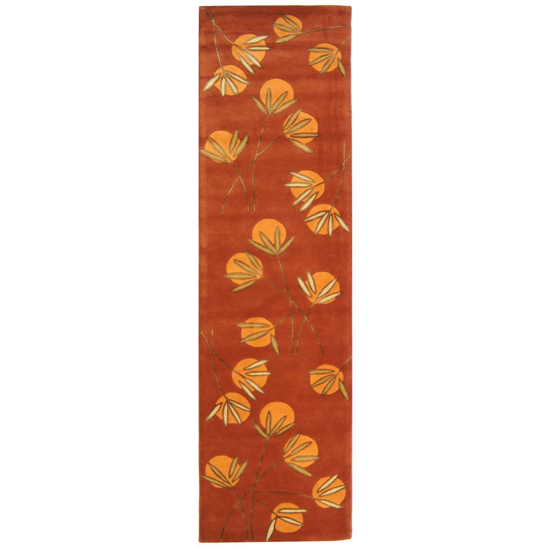 SAFAVIEH Soho Collection SOH304A Handmade Rust Rug Image 1