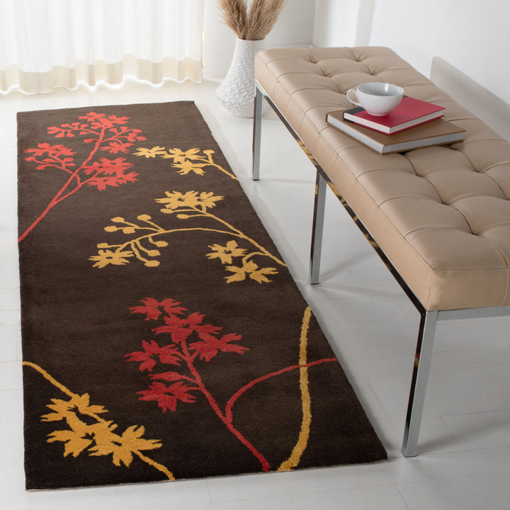 SAFAVIEH Soho Collection SOH316A Handmade Brown / Red Rug Image 11