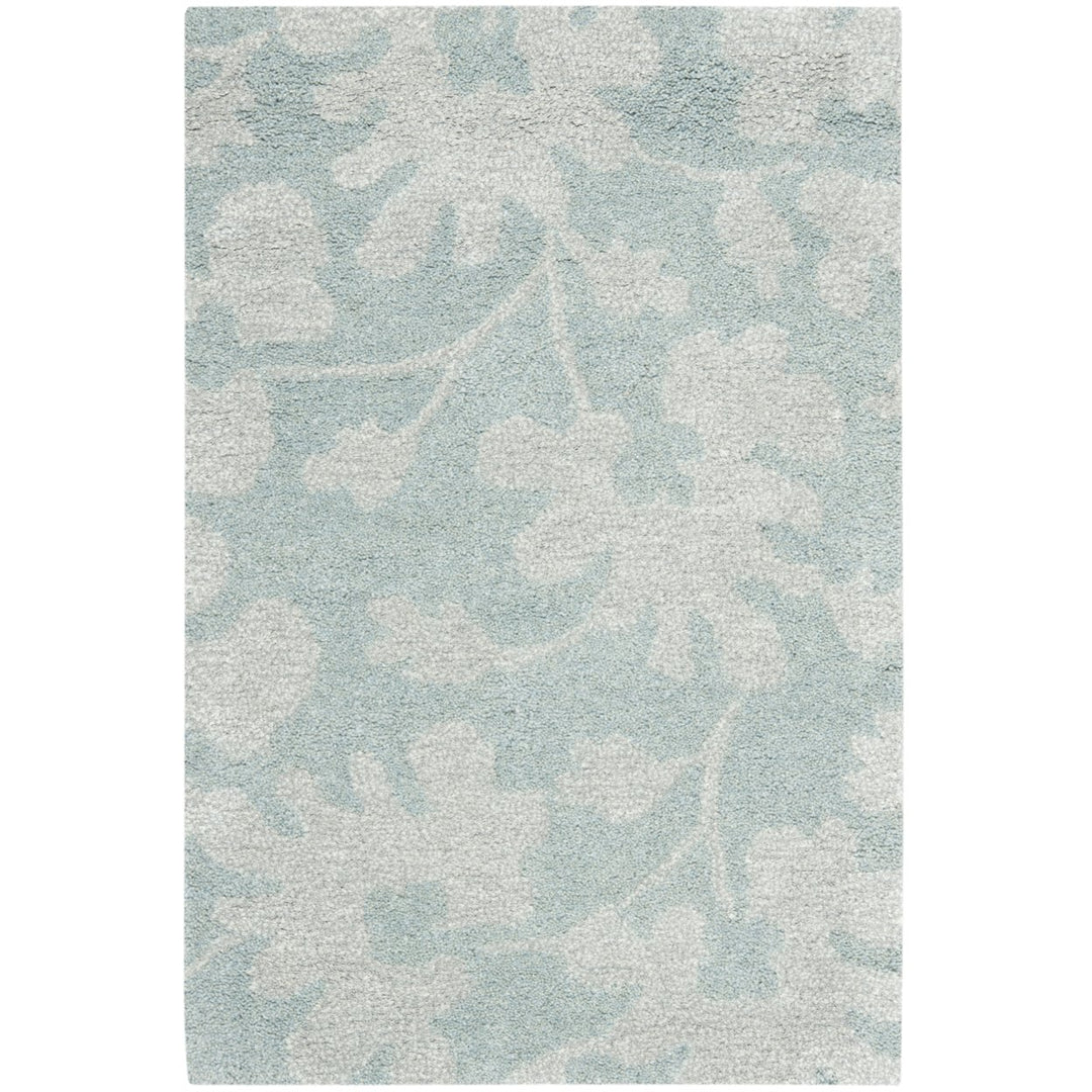 SAFAVIEH Soho SOH419B Handmade Light Blue / Silver Rug Image 1