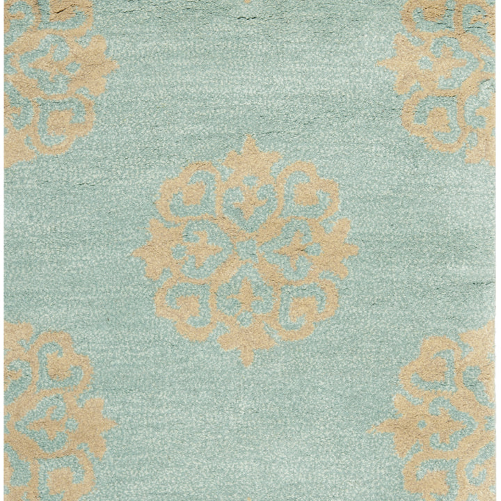 SAFAVIEH Soho Collection SOH424A Handmade Turquoise Rug Image 7