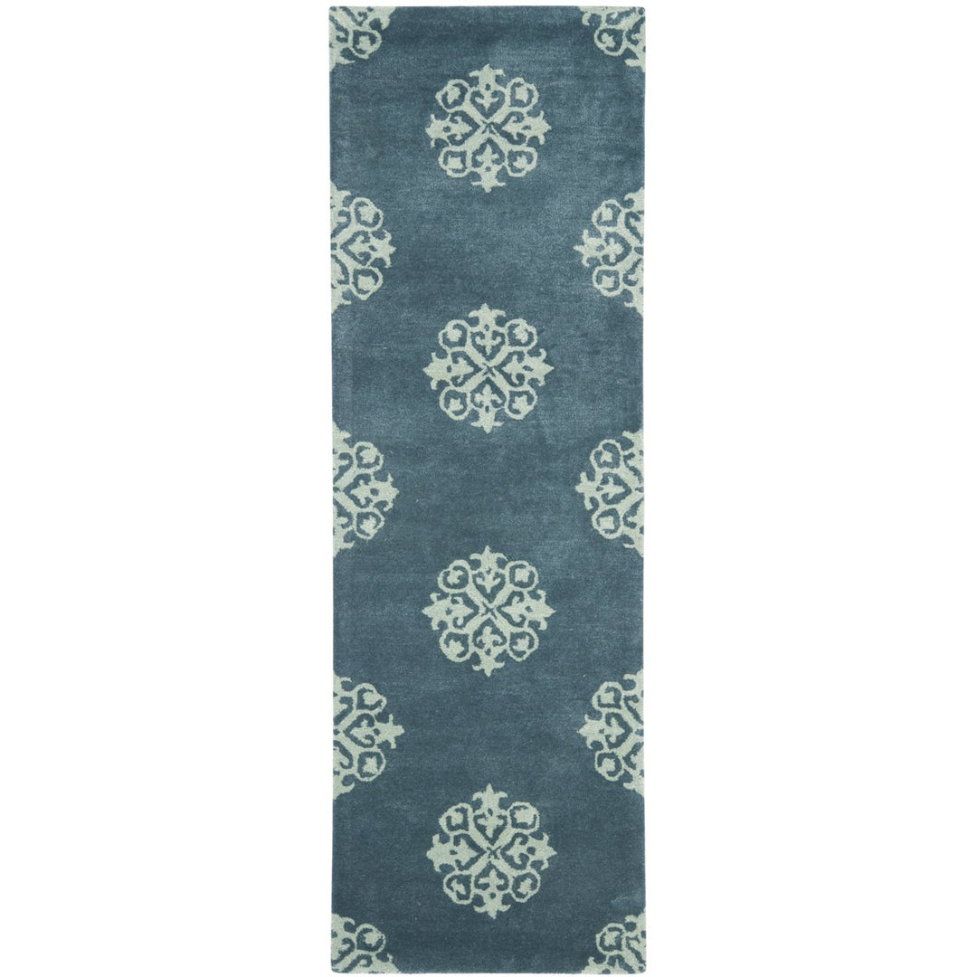 SAFAVIEH Soho Collection SOH424B Handmade Blue Rug Image 1