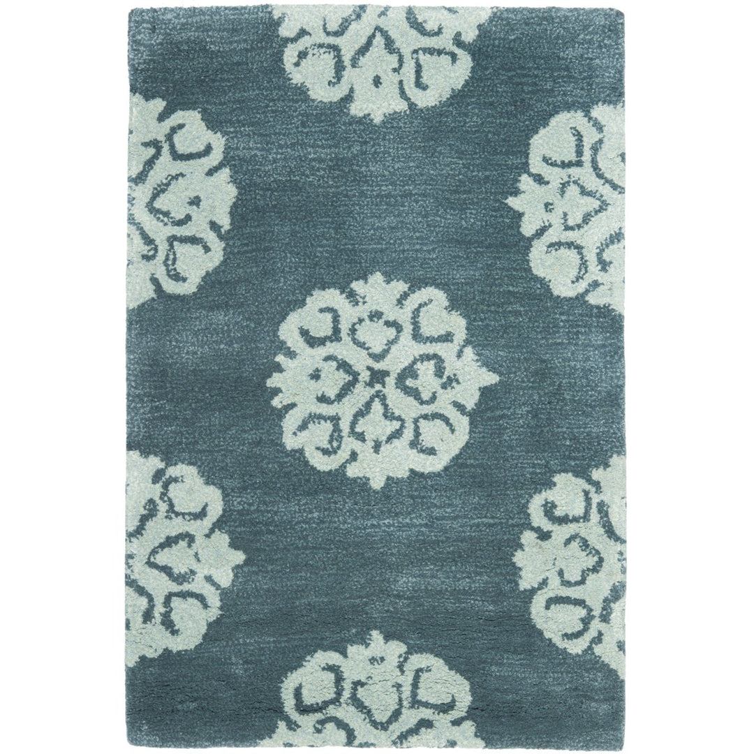 SAFAVIEH Soho Collection SOH424B Handmade Blue Rug Image 1