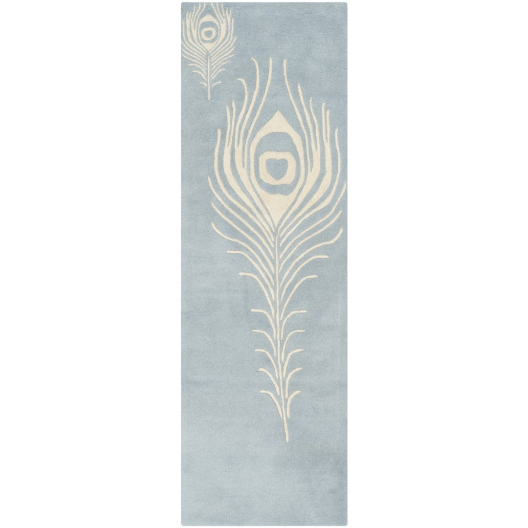 SAFAVIEH Soho SOH704B Handmade Light Blue / Ivory Rug Image 1