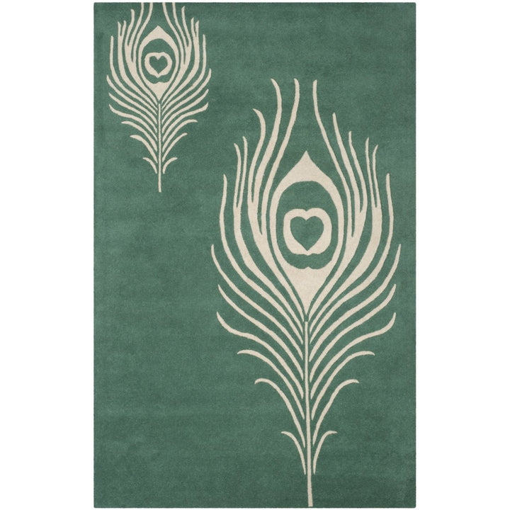 SAFAVIEH Soho Collection SOH704T Handmade Teal/Ivory Rug Image 1