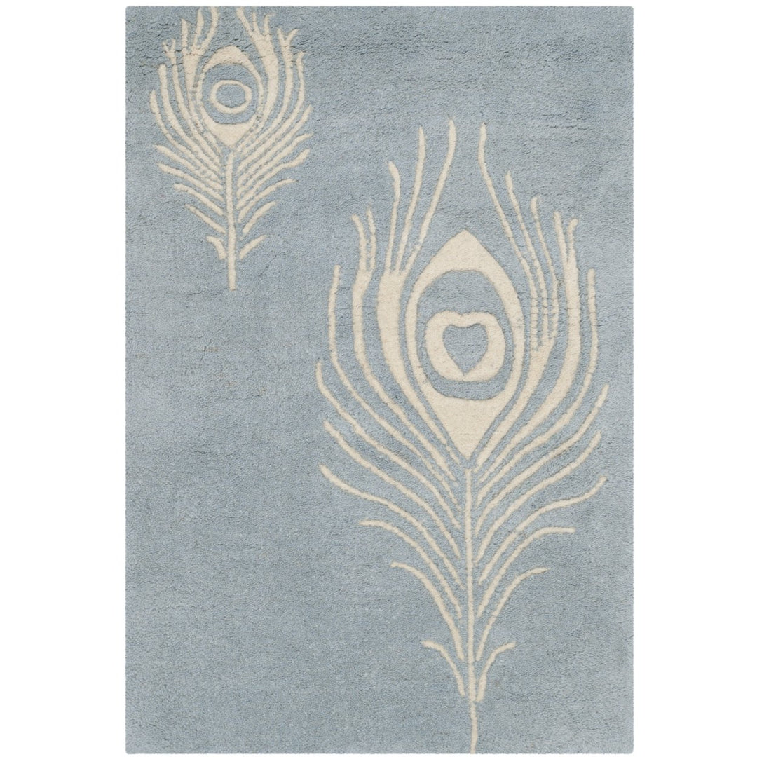 SAFAVIEH Soho SOH704B Handmade Light Blue / Ivory Rug Image 1