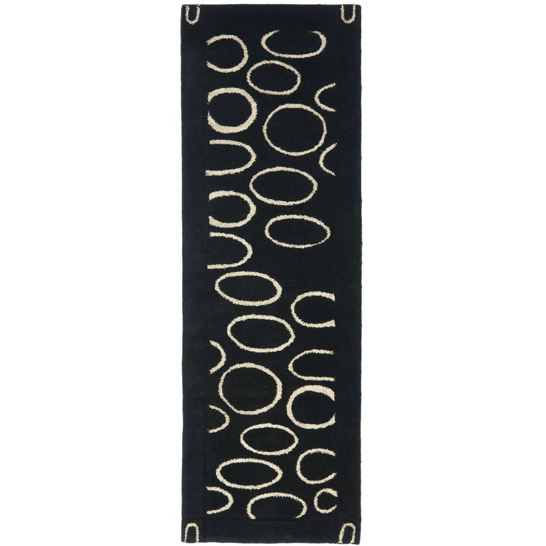 SAFAVIEH Soho SOH714A Handmade Black / Ivory Rug Image 1