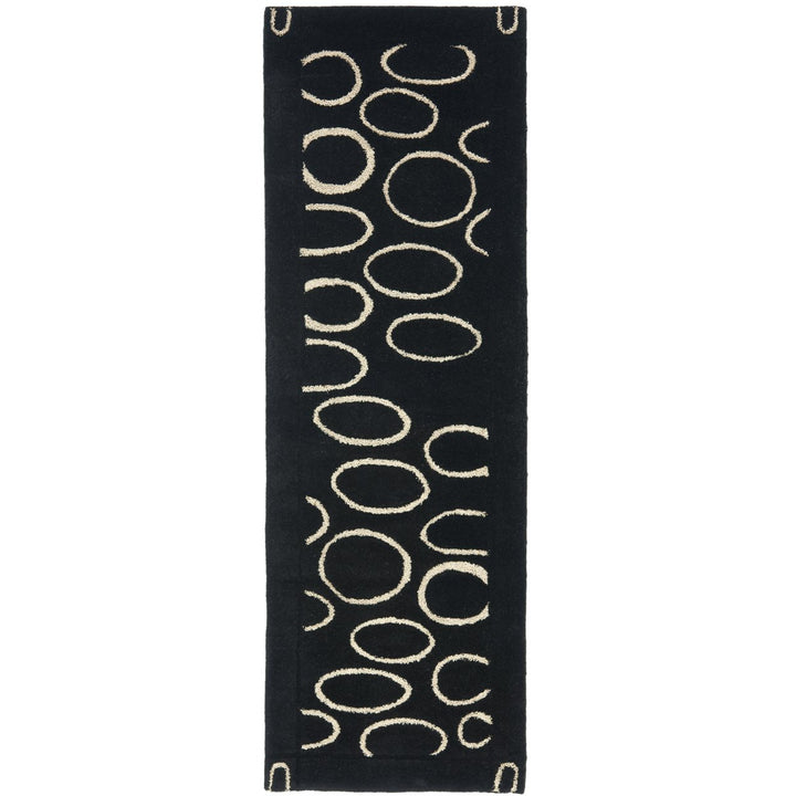 SAFAVIEH Soho SOH714A Handmade Black / Ivory Rug Image 1