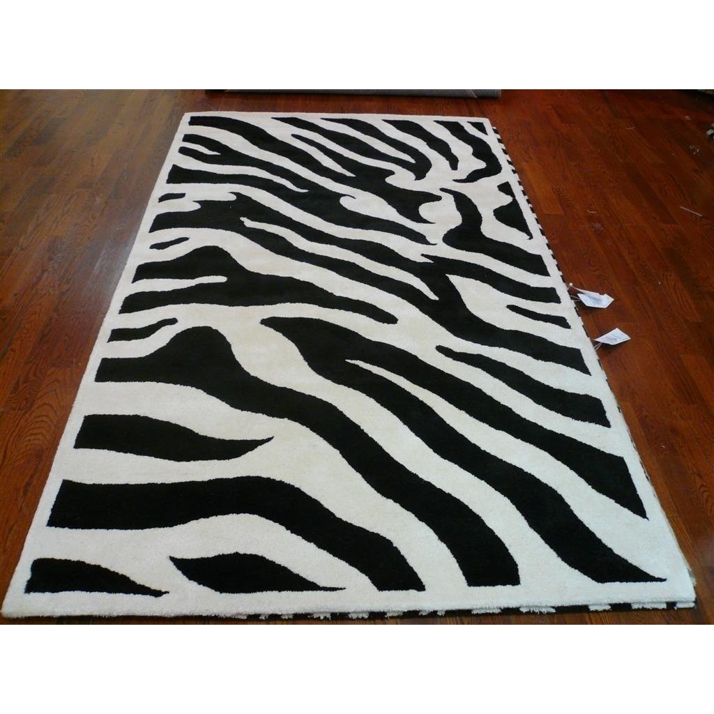 SAFAVIEH Soho SOH717A Handmade White / Black Rug Image 1