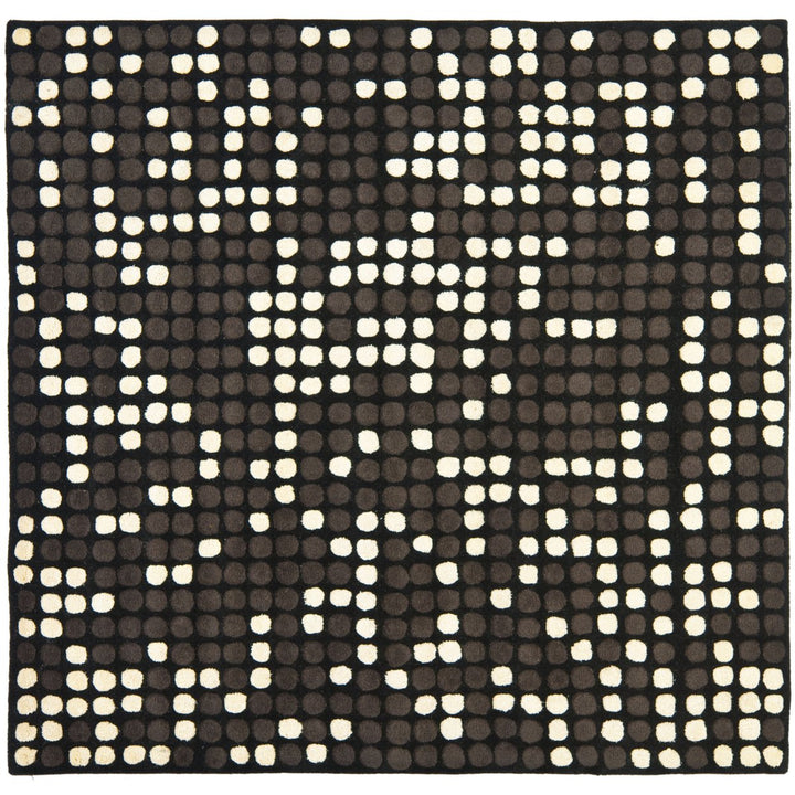 SAFAVIEH Soho SOH726A Handmade Black / White Rug Image 1