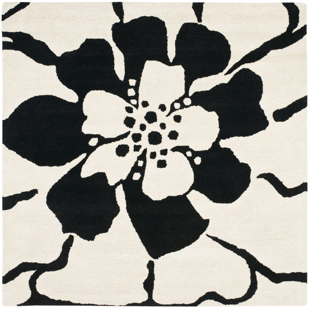 SAFAVIEH Soho SOH730A Handmade Black / White Rug Image 1