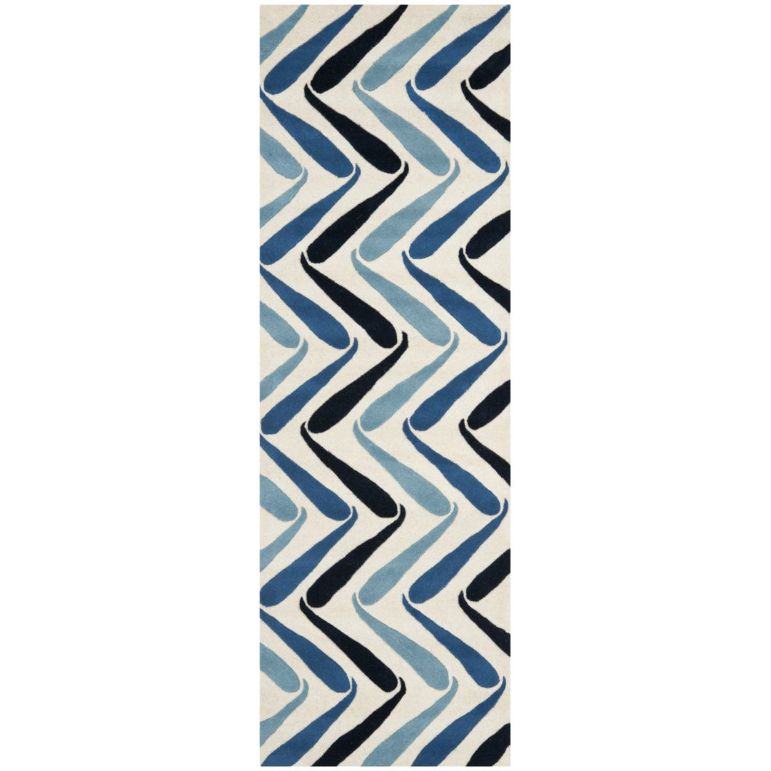 SAFAVIEH Soho Collection SOH731A Handmade Ivory/Blue Rug Image 1