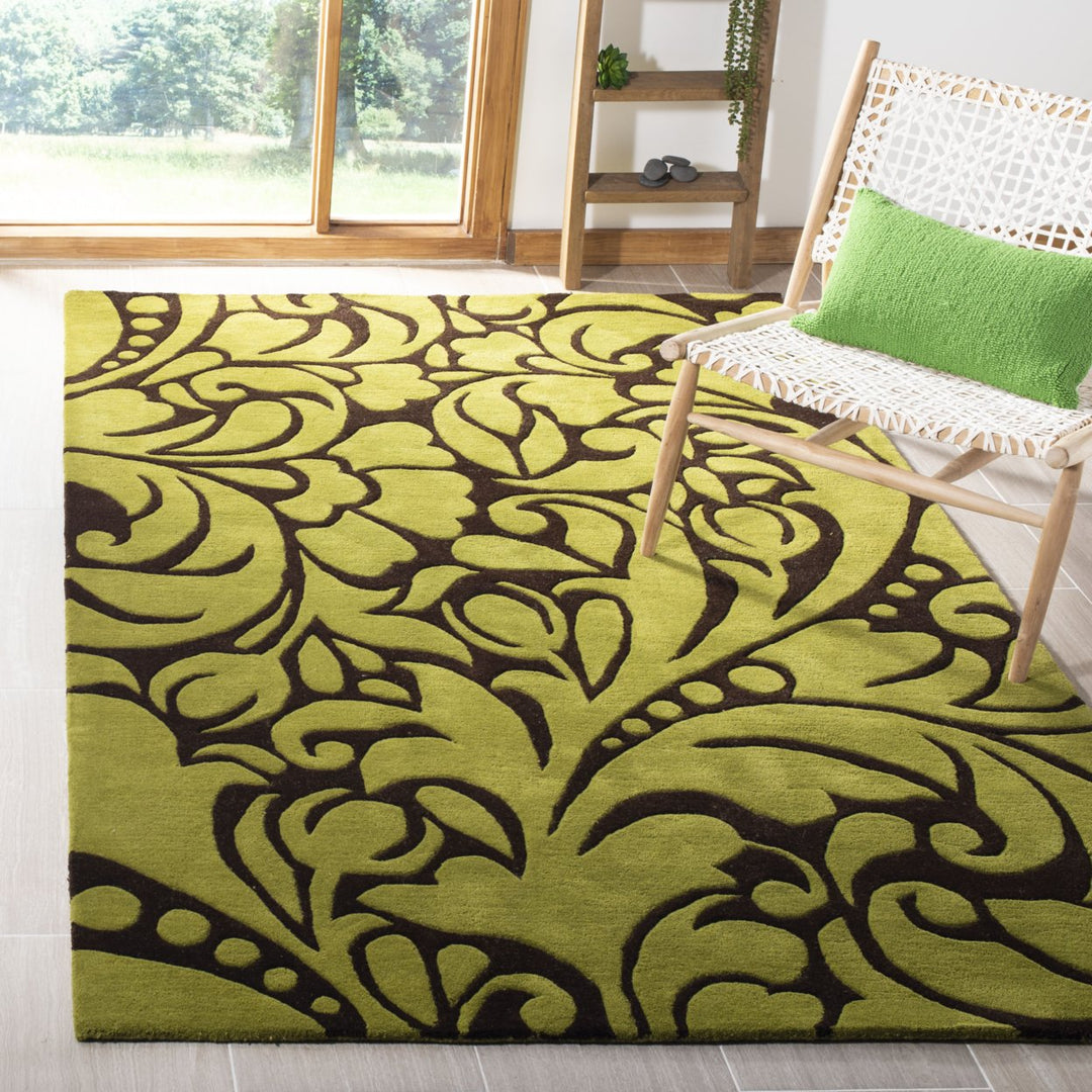 SAFAVIEH Soho SOH759A Handmade Brown / Green Rug Image 1