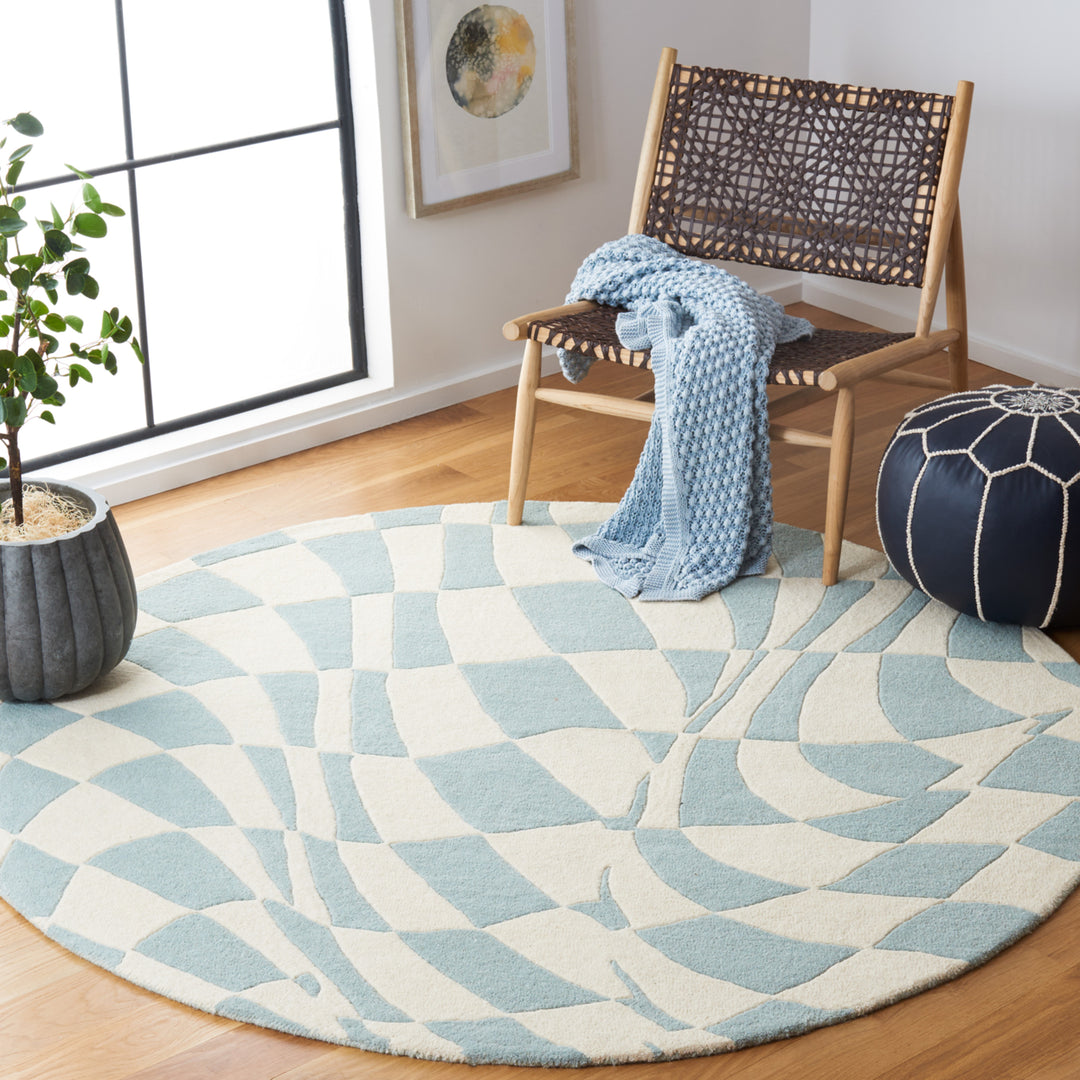 SAFAVIEH Soho Collection SOH763A Handmade Blue/Ivory Rug Image 2