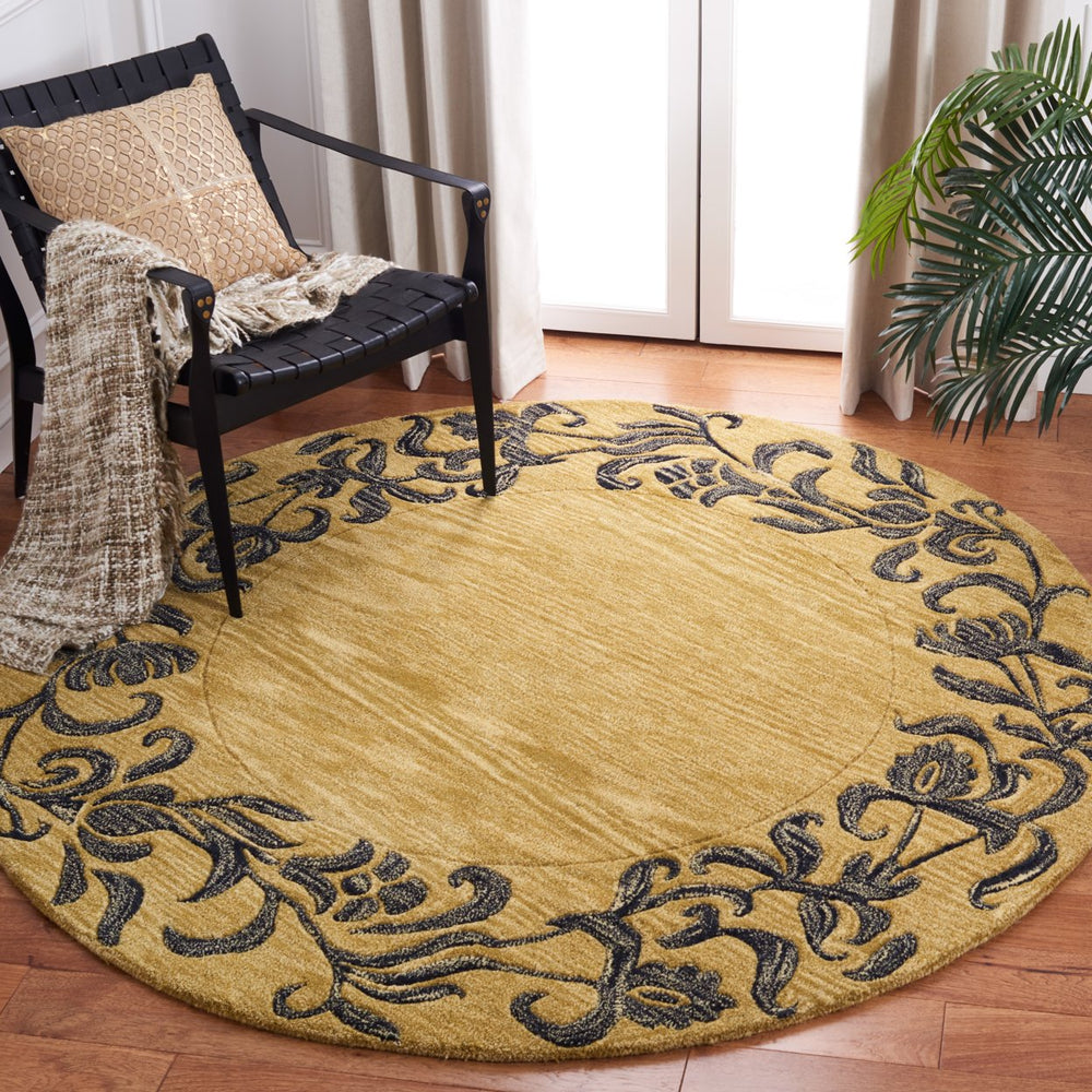 SAFAVIEH Soho Collection SOH773B Handmade Gold/Black Rug Image 2