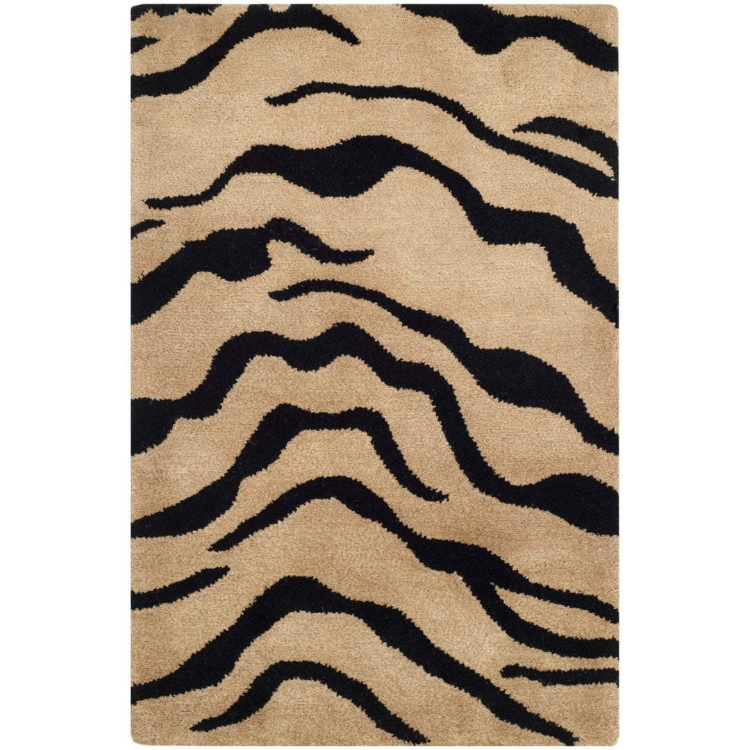 SAFAVIEH Soho Collection SOH789A Handmade Gold/Black Rug Image 1