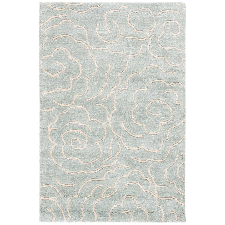 SAFAVIEH Soho SOH812B Handmade Soft Lt. Blue / Ivory Rug Image 1