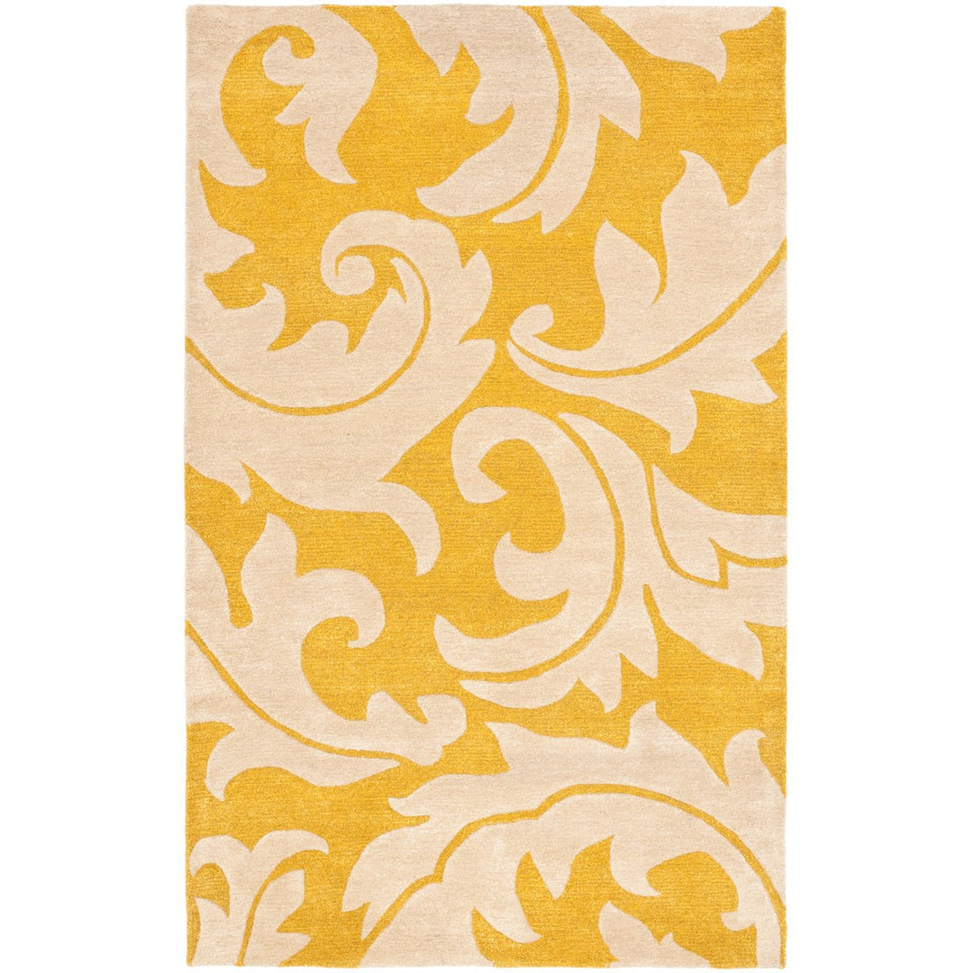 SAFAVIEH Soho Collection SOH841A Handmade Gold/Ivory Rug Image 1