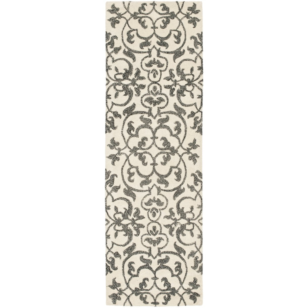 SAFAVIEH Soho Collection SOH840A Handmade Ivory/Grey Rug Image 1