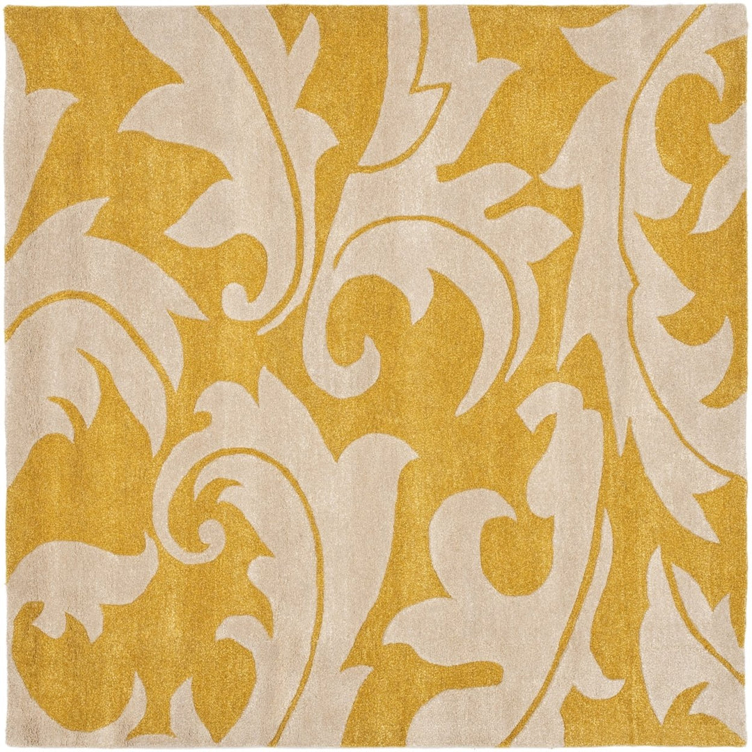 SAFAVIEH Soho Collection SOH841A Handmade Gold/Ivory Rug Image 1