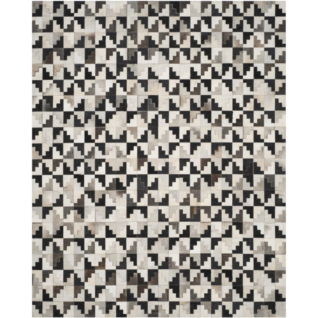 SAFAVIEH Studio Leather STL172A Ivory / Black Rug Image 1