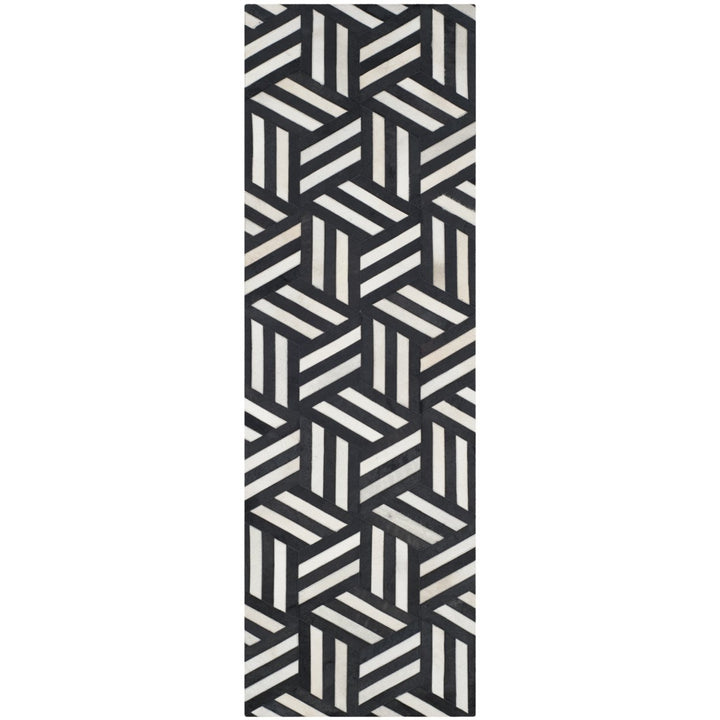 SAFAVIEH Studio Leather STL219A Ivory / Black Rug Image 1