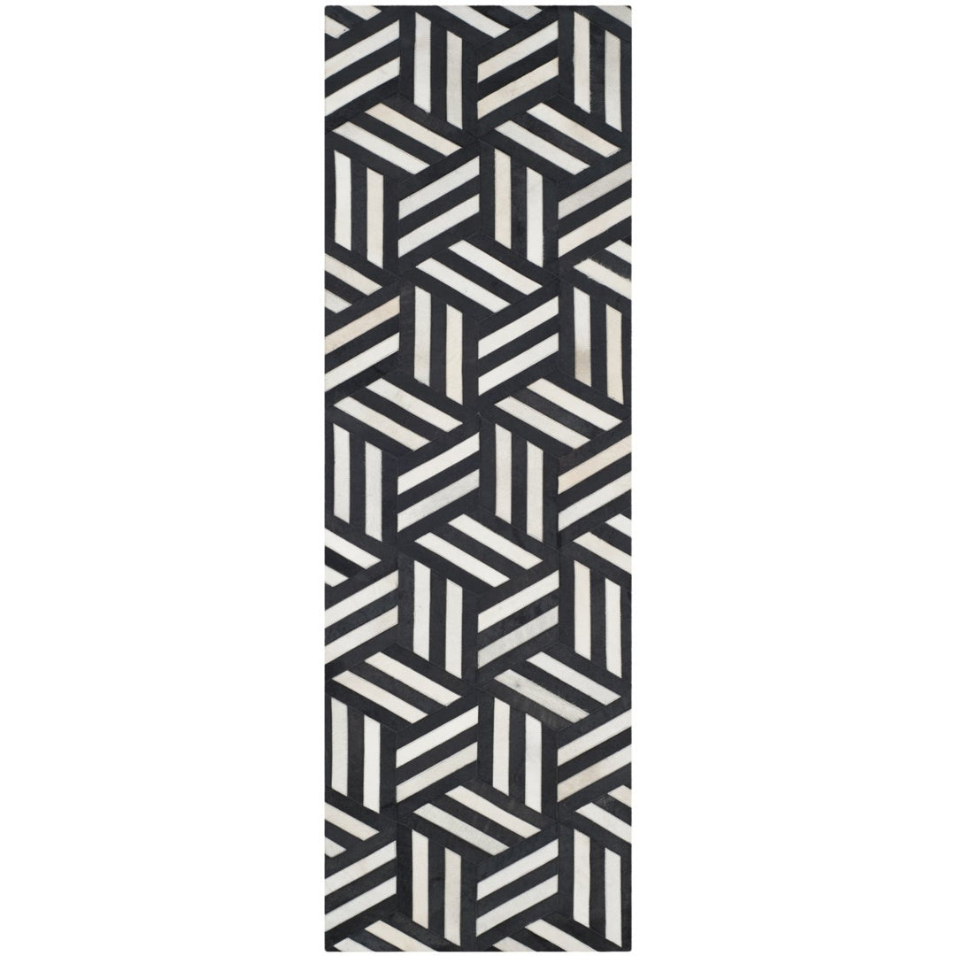 SAFAVIEH Studio Leather STL219A Ivory / Black Rug Image 1