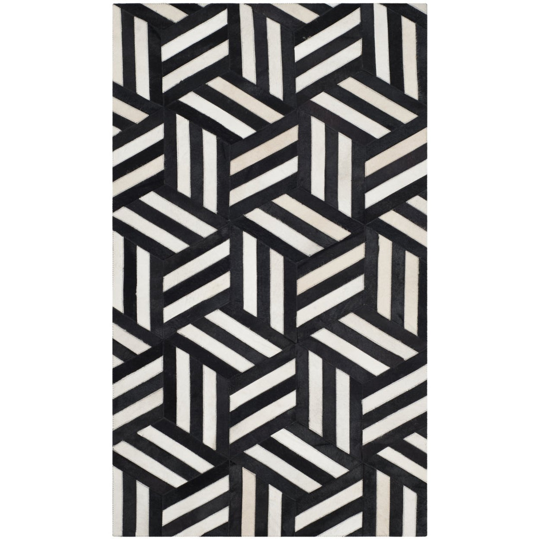 SAFAVIEH Studio Leather STL219A Ivory / Black Rug Image 1