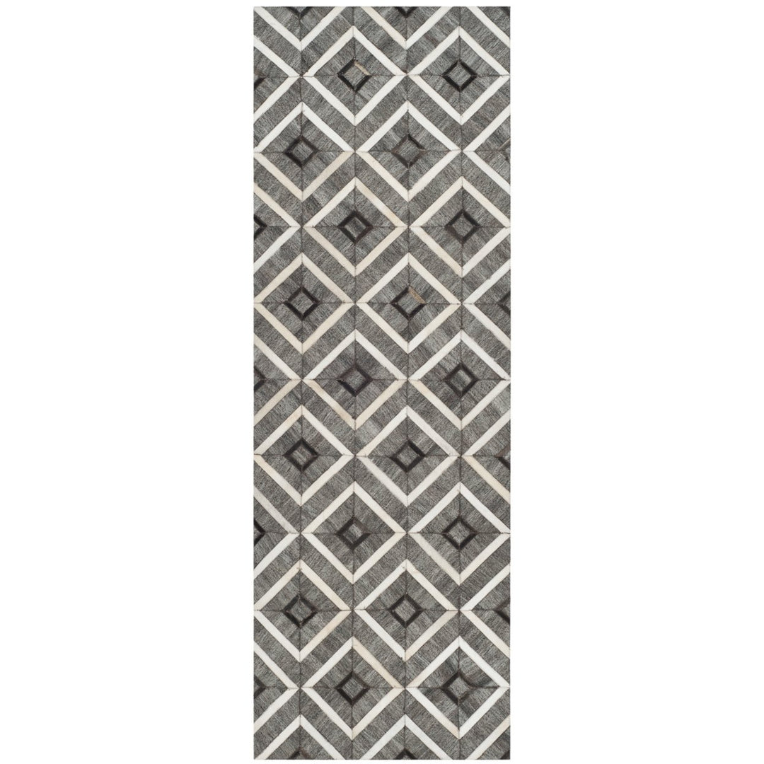 SAFAVIEH Studio Leather STL220A Ivory / Grey Rug Image 1