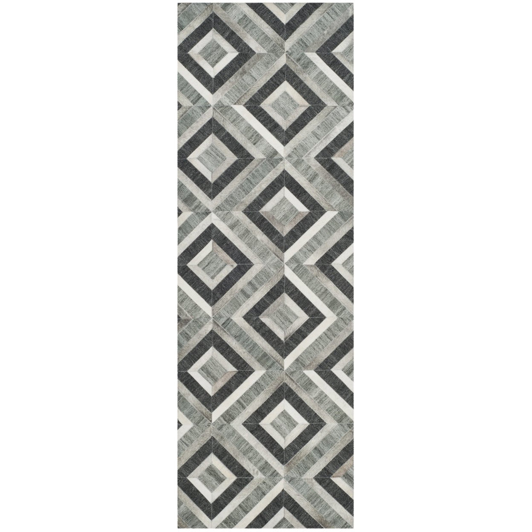 SAFAVIEH Studio Leather STL221A Ivory / Dark Grey Rug Image 1