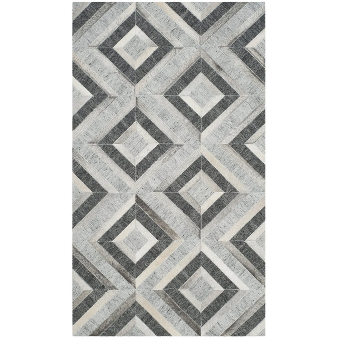 SAFAVIEH Studio Leather STL221A Ivory / Dark Grey Rug Image 1