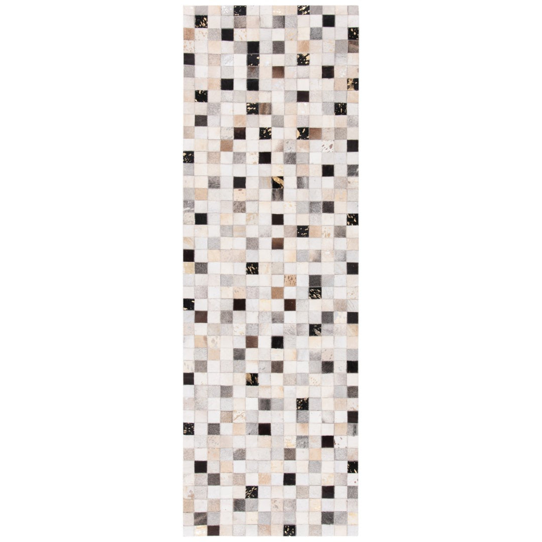 SAFAVIEH Studio Leather STL810A Ivory / Black Rug Image 1