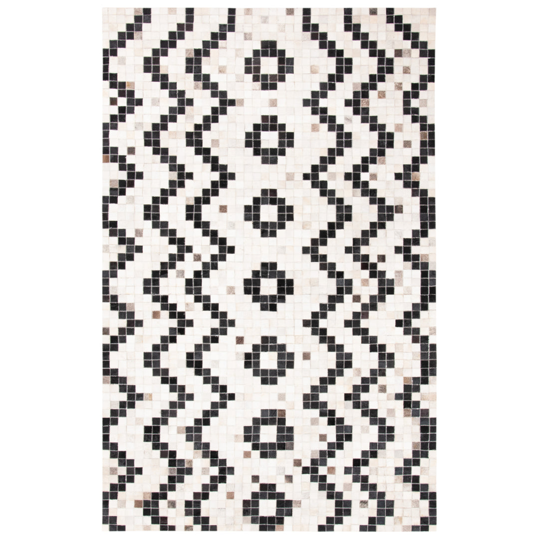 SAFAVIEH Studio Leather STL811A Ivory / Black Rug Image 1