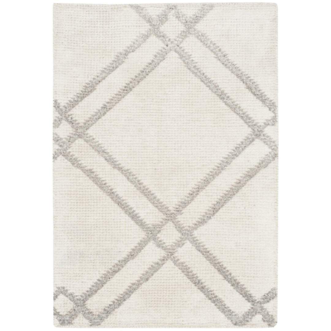 SAFAVIEH Stone Wash STW701A Hand-knotted Dove /Ivory Rug Image 1